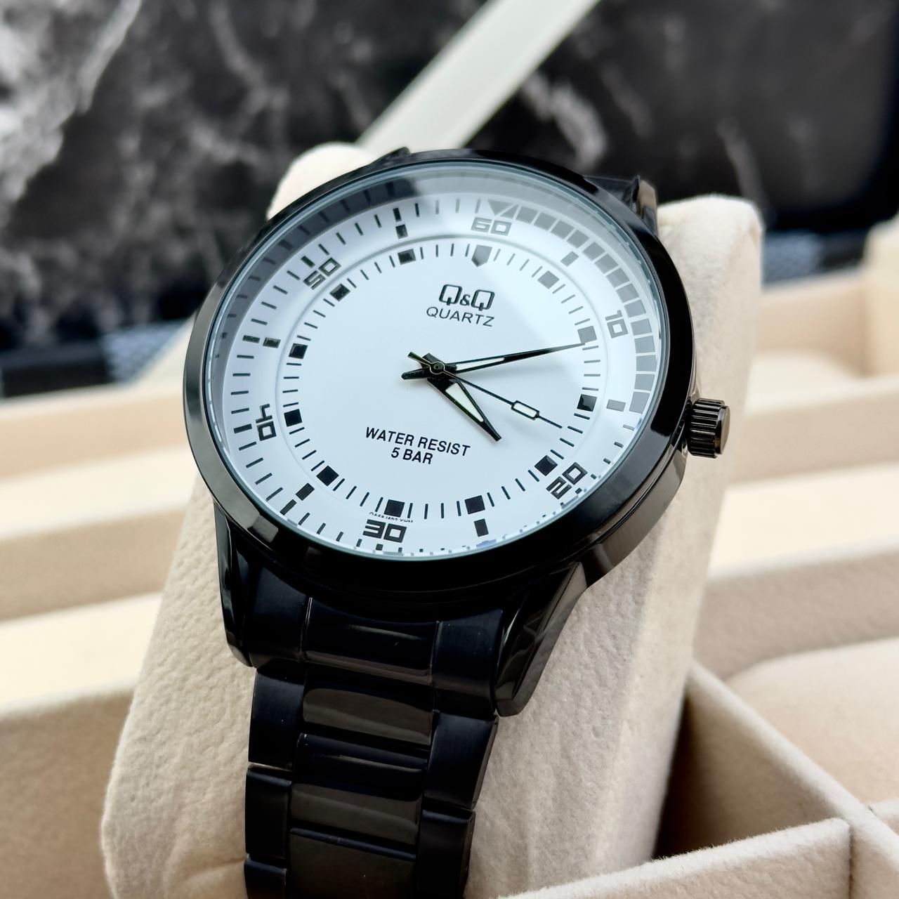 Q&Q - C36